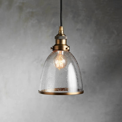 Thea antiqued brass cloche pendant with seeded glass